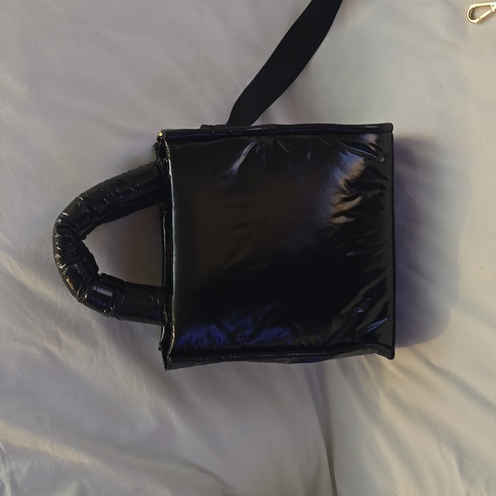 Black puffer purse.